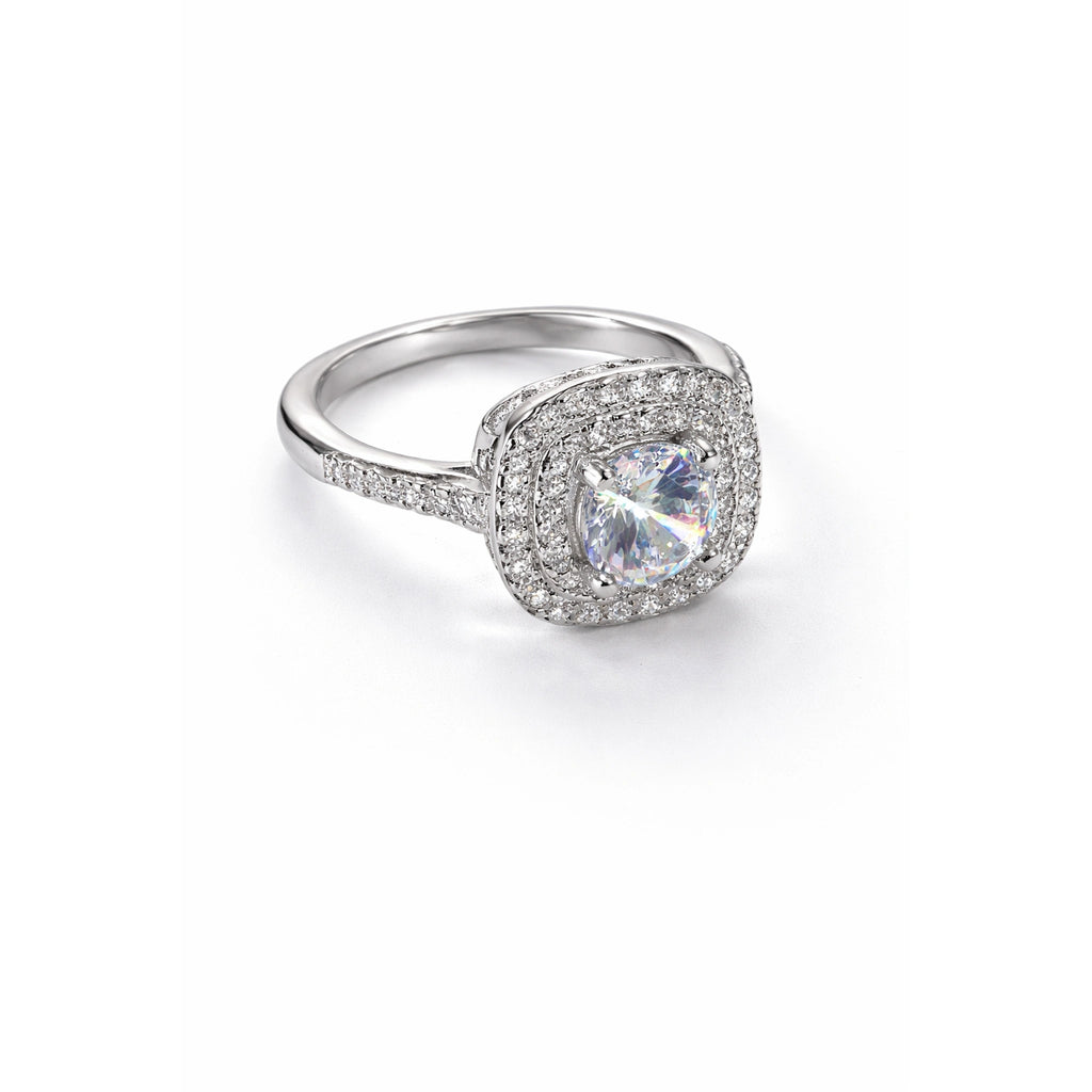 Oval halo silver ring with iridescent gemstone and pavé diamonds on white background