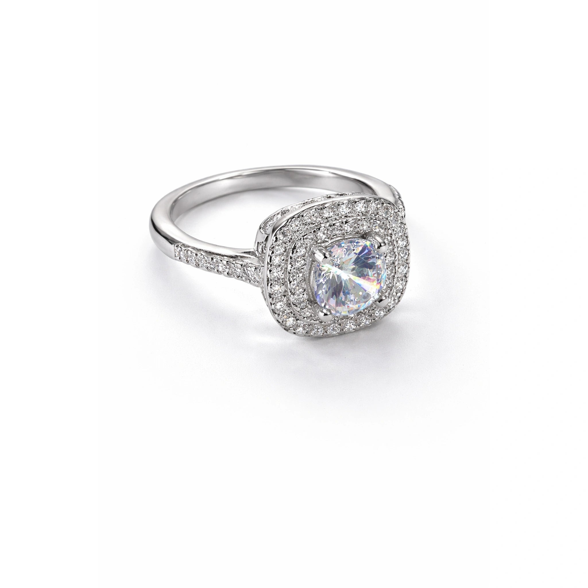 Oval halo silver ring with iridescent gemstone and pavé diamonds on white background
