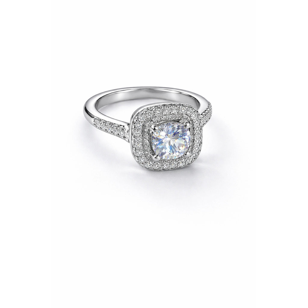 Silver ring with a diamond on a white background